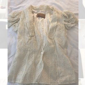 Vintage John Galliano white lace blouse with puff sleeves.